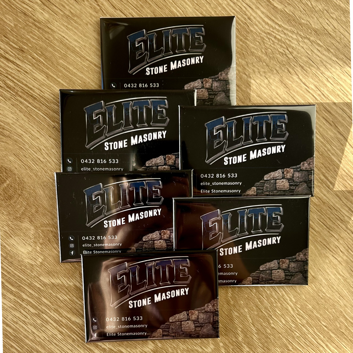custom promotional photo magnets featuring a business logo for marketing and events.